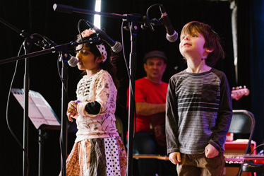 Kids playing music instruments